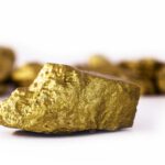 Welke factoren beïnvloeden de goudprijs?